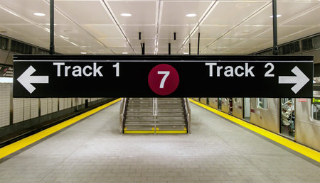 New York, August 10, 2017: Track one and two indicator is suspended from the ceiling at Hudson Yards subway station in Manhattan.のeditorial素材