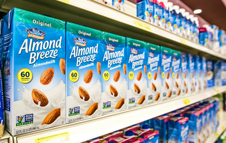Holetown, Barbados, 03-19-2018: Cartons of Blue Diamond Almond Breeze stand on a shelf of a local supermarket.のeditorial素材