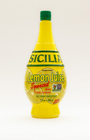 New York, January 30, 2017: A bottle of Sicilia lemon juice isolated on white background.のeditorial素材