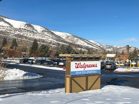 Park City, UT, 12/28/2018: Walgreens pharmacy sign on the parking lot in front of the drug store.のeditorial素材