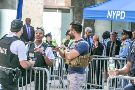 New York City, 9/27/2019: Secret Service agents and other security personnel is deployed at a police checkpoint in Manhattan during UN General Assembly.のeditorial素材