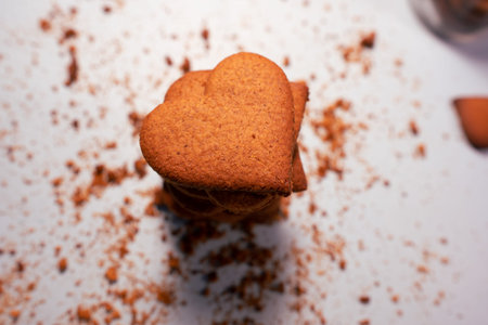 Homemade chocolate hearth shaped cookies and butter cookie on white background