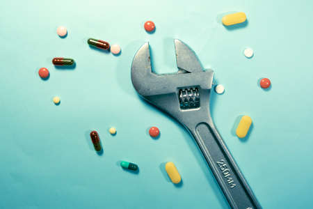 Pills and wrench picture - abstract conceptの写真素材