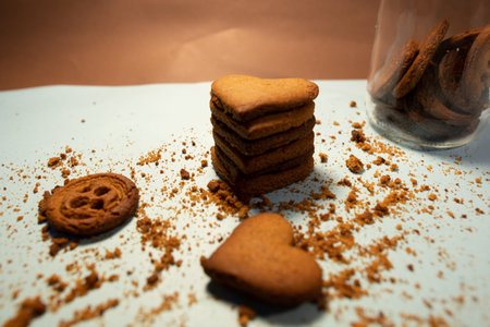 Homemade chocolate hearth shaped cookies and butter cookie on white background