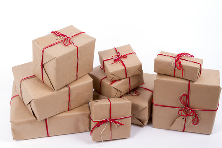 Gift boxes, New Year 2016. Kraft paper bows ribbons, lace. Festive creative composition. Merry Christmas. Handmade, retro, vintage,の写真素材