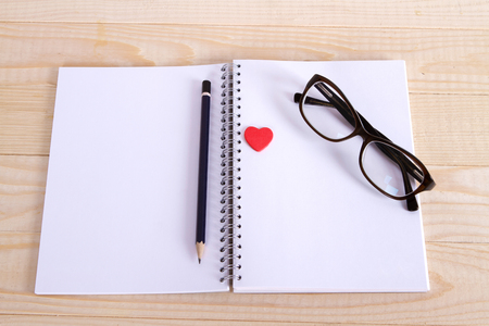 notebook glasses pencil heart. loving thoughts and notesの写真素材