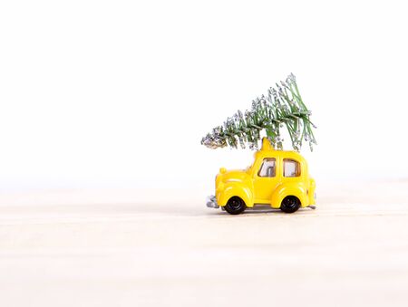 car driven by the Christmas tree for the New Yearの写真素材