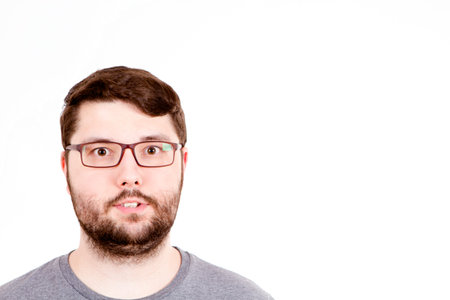 Surprised man with a beard with bulging eyes