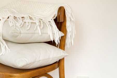 chair with pillowsの写真素材