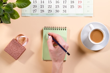 office desk table with blank notebook page with pen Top view, flat lay.の写真素材