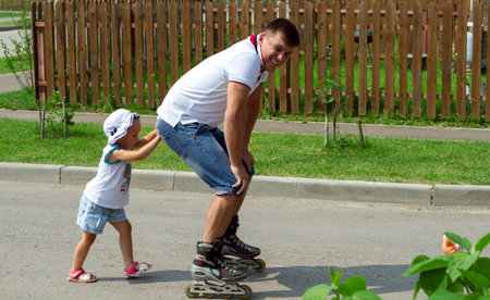 Father and daughter enjoying summerの写真素材