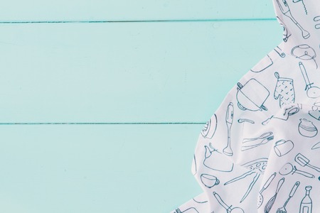 top view of checkered napkin on wooden tableの写真素材