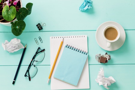 Blank notebook with flower, Top viewの写真素材