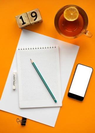 2019 new year goal,plan,action text on notepad with office accessories.の写真素材