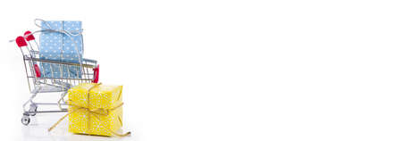 colorful gifts box,supermarket shopping cartの写真素材