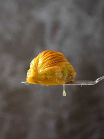 Mussel Baklava with Pistachio. Close-up. Traditional Middle Eastern Flavors. Traditional Turkish baklava. local name midye baklavaの写真素材