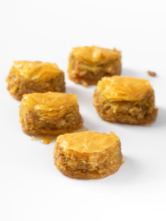 Oriental sweets. Turkish delight, pistachio baklava. Fragrant tea. Still life with Turkish mood. For advertising, window dressing, travel posters and cafes.の写真素材