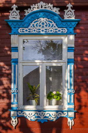 Window with carved platbandsの写真素材