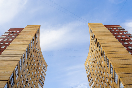 Residential house with two towers on a sunny dayの写真素材