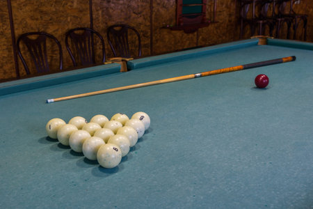 Billiard Cue and balls on the table