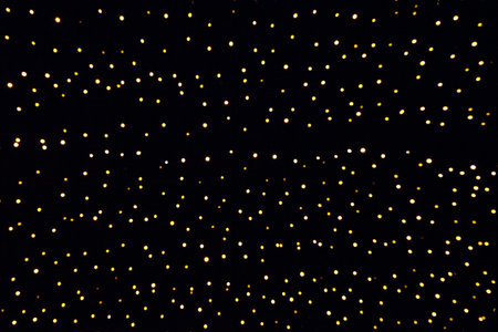 Dark background with golden lights