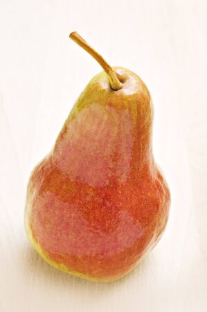 Ripe pear in autumn colors - close upの写真素材