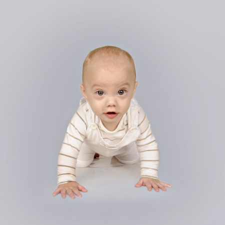 Cute baby boy in white clothingの写真素材