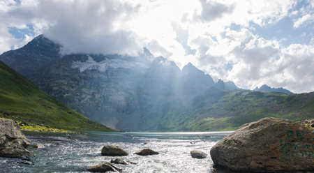 Sunset of wooden boats on Dal Lake in Srinagar, India. The lake, situated in the northeast of Srinagar, is one of the most beautiful lakes in India.の写真素材