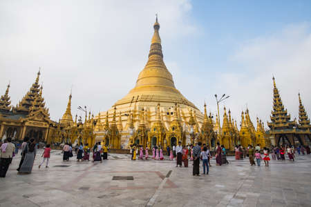 YANGON, MYANMAR - MAR 07, 2017: Atmosphere inside the temple at Shwedagon pagoda . A  pagoda that symbolize the spiritual and famous tourist attraction in Yangon, Myanmarのeditorial素材