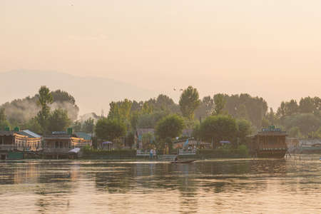 Srinagar, India - 21 JULY 2018. Sunset of wooden boats on Dal Lake in Srinagar, India. The lake, situated in the northeast of Srinagar, is one of the most beautiful lakes in India.のeditorial素材