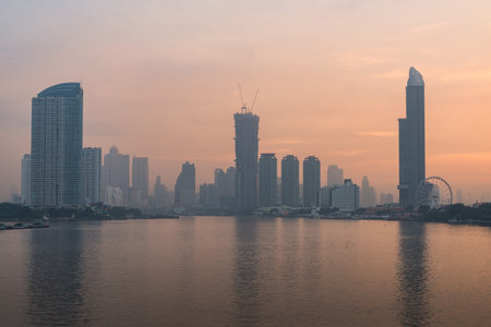 "CHAO PRAYA RIVER" That 's water public transport and different vessels andview of building. THAILANDのeditorial素材