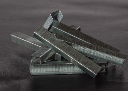 staples for industrial staple gun on a dark backgroundの写真素材