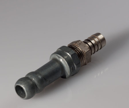 a nut and bolt on a black background steel