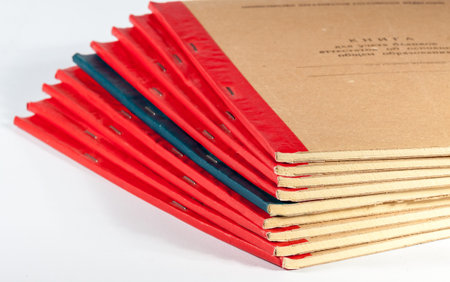 old books of the accountant's stack, on a white background