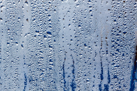 water drops on transparent glass macro