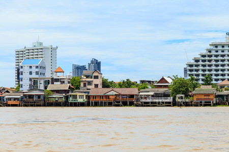 Picture of the houses along the Chao Phraya River when flood tide.の写真素材