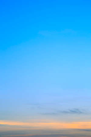 Vertical image white clouds in blue sky in the morning.の写真素材