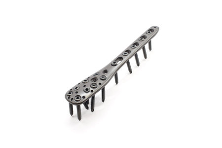 Proximal Humerus plate with screw on white background with multiple holes for screw insertion for...