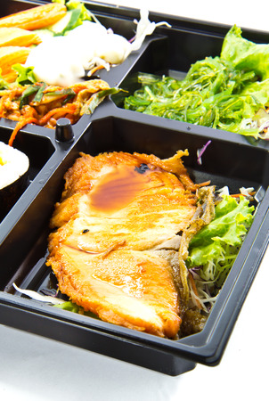 Lunch Box (Bento)  Salad, Salmon and Sushi Rollの写真素材