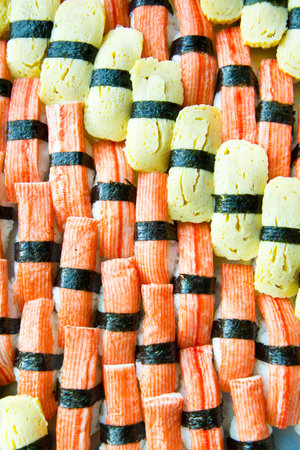 background of sushi with egg and Imitation Crab Stickの写真素材