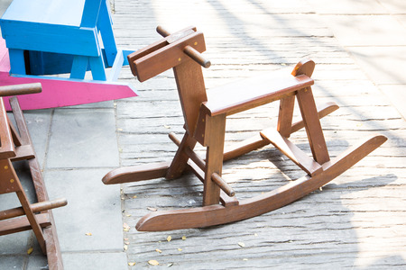 vintage wooden rocking horsesの写真素材