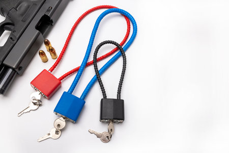 Weapon cable lock keys used to safely secure a firearm from being used , Gun safety and control...