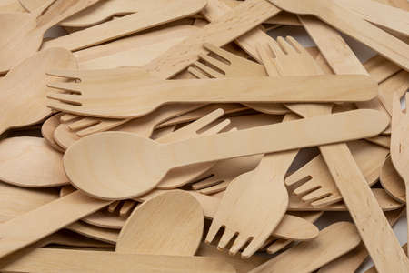 Eco natural wooden spoons and forks for backgroundの写真素材