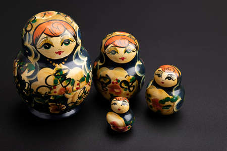 Traditional Russian doll on black background , Souvenirs for touristsの写真素材