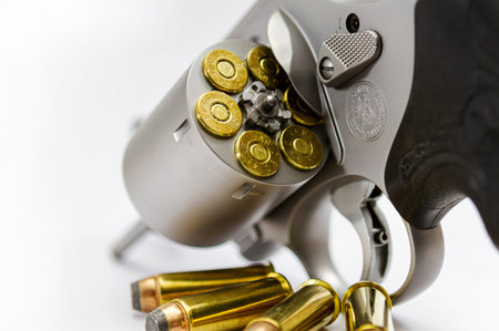 Bangkok,Thailland - June18,2002 : .44 magnum revolver hand gun and bullets on white background