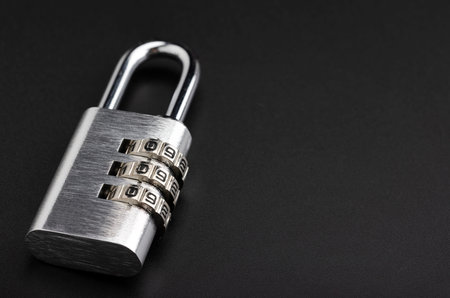 Combination key code locked on black background , Security and safety concept