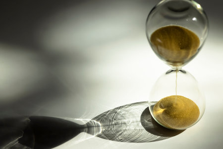 Sand clock , Hourglass as time passing on white background , Life time passed concept