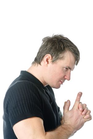 Absorbed man looks at his handsの写真素材