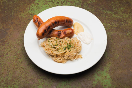 grilled sausages and sausage on a plate