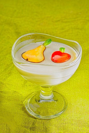 Whipped cream dessert pears and strawberriesの写真素材